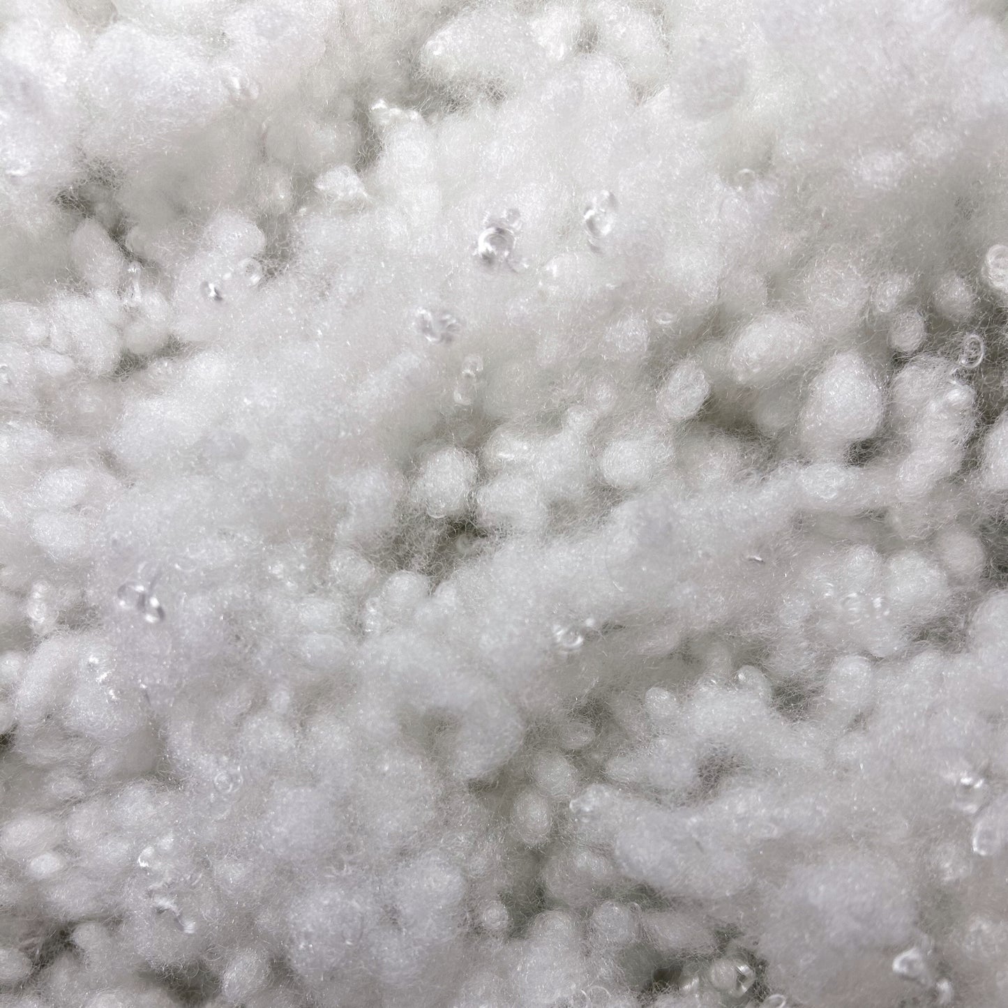 Szilikonizált poliésztergolyó tömőanyag